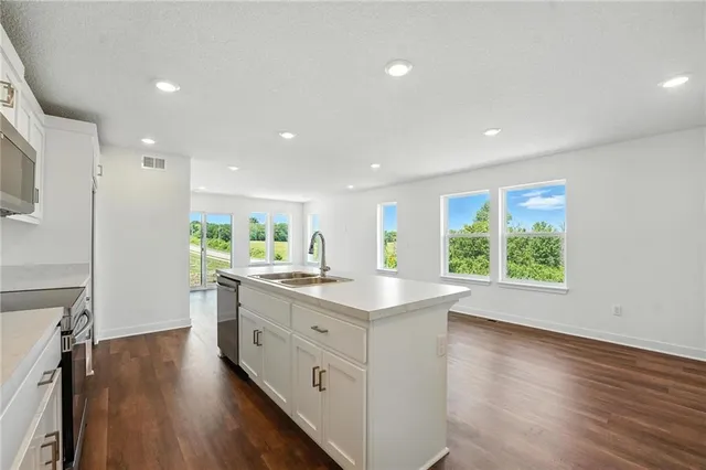 $317,900 | 8708 Southwest Edgewater Drive, Blue Springs, MO 64064