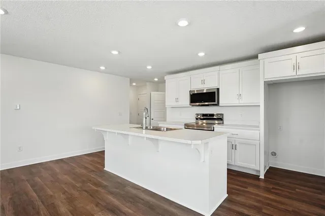 $317,900 | 8708 Southwest Edgewater Drive, Blue Springs, MO 64064