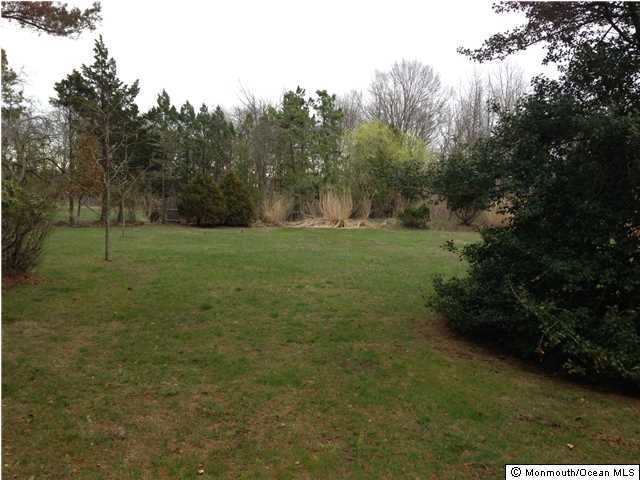 450 Little Silver Point Road Little Silver, NJ 07739 - Photo 3 of 6 a big yard with lots of green space and trees