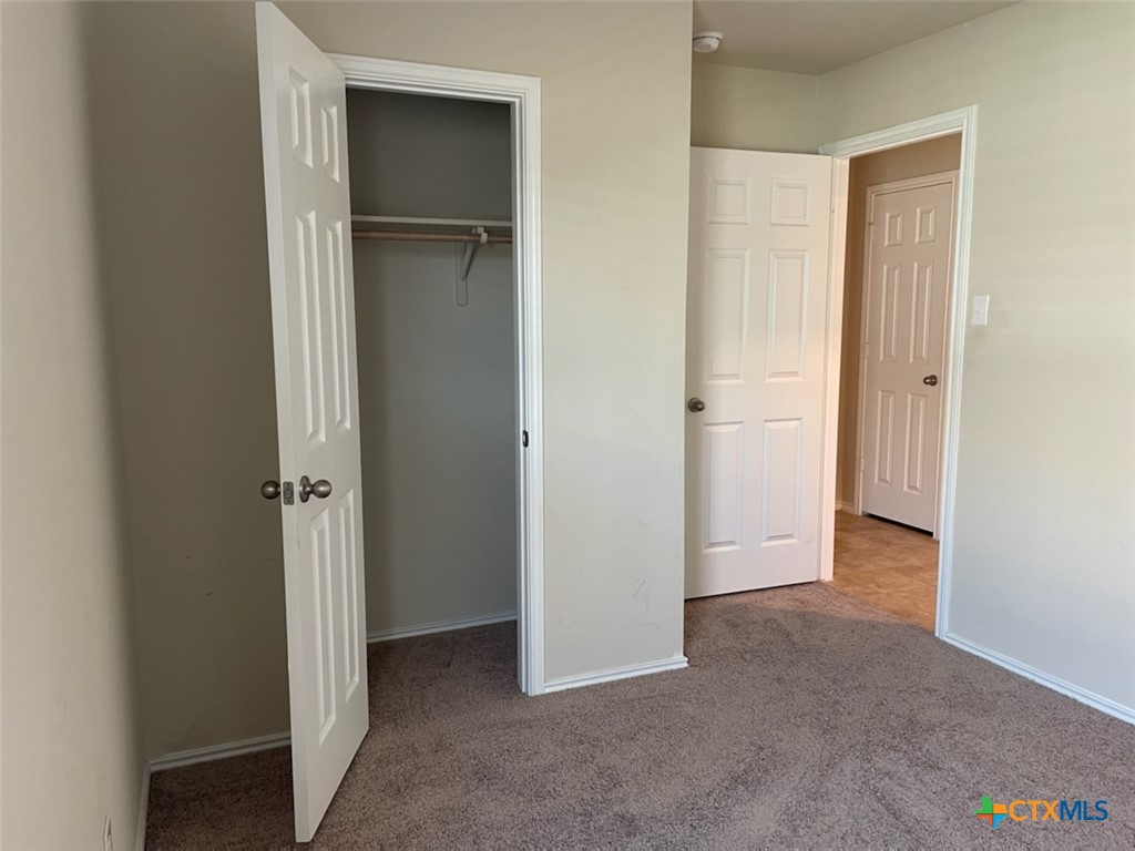 6114 Sally Ride Lane Killeen, TX 76543 - Photo 13 of 21 a view of an empty room with closet and entryway