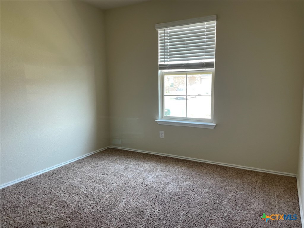 6114 Sally Ride Lane Killeen, TX 76543 - Photo 17 of 21 an empty room with a window