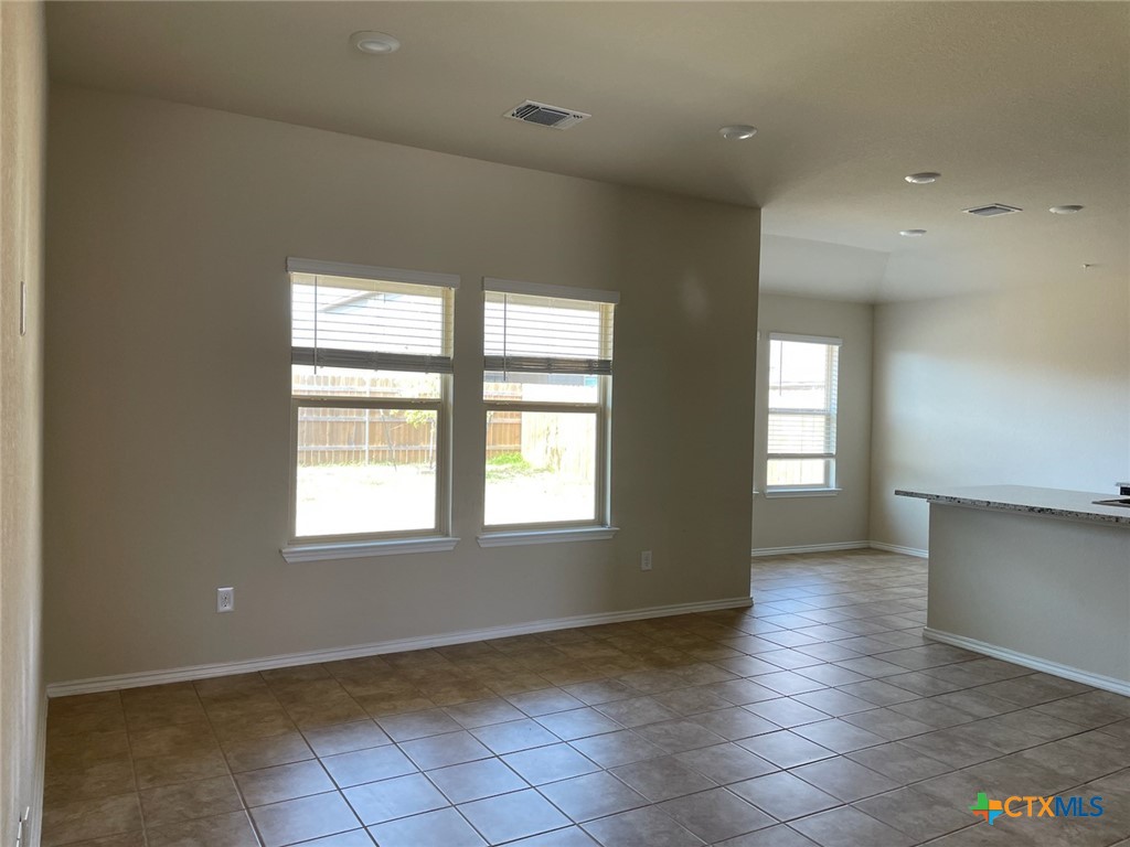 6114 Sally Ride Lane Killeen, TX 76543 - Photo 3 of 21 an empty room with windows and entrance