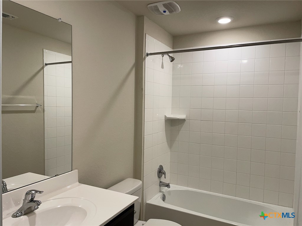 6114 Sally Ride Lane Killeen, TX 76543 - Photo 9 of 21 a bathroom with a shower and a sink