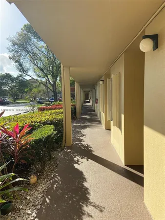 a view of a porch with a yard