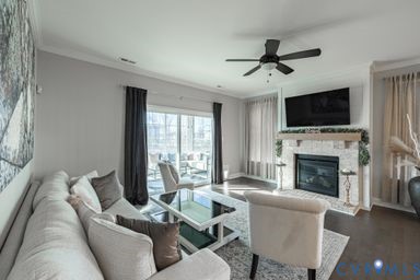 6860 Dunton Road Chesterfield, VA 23832 - Photo 18 of 48 Living room with fireplace, a ceiling fan