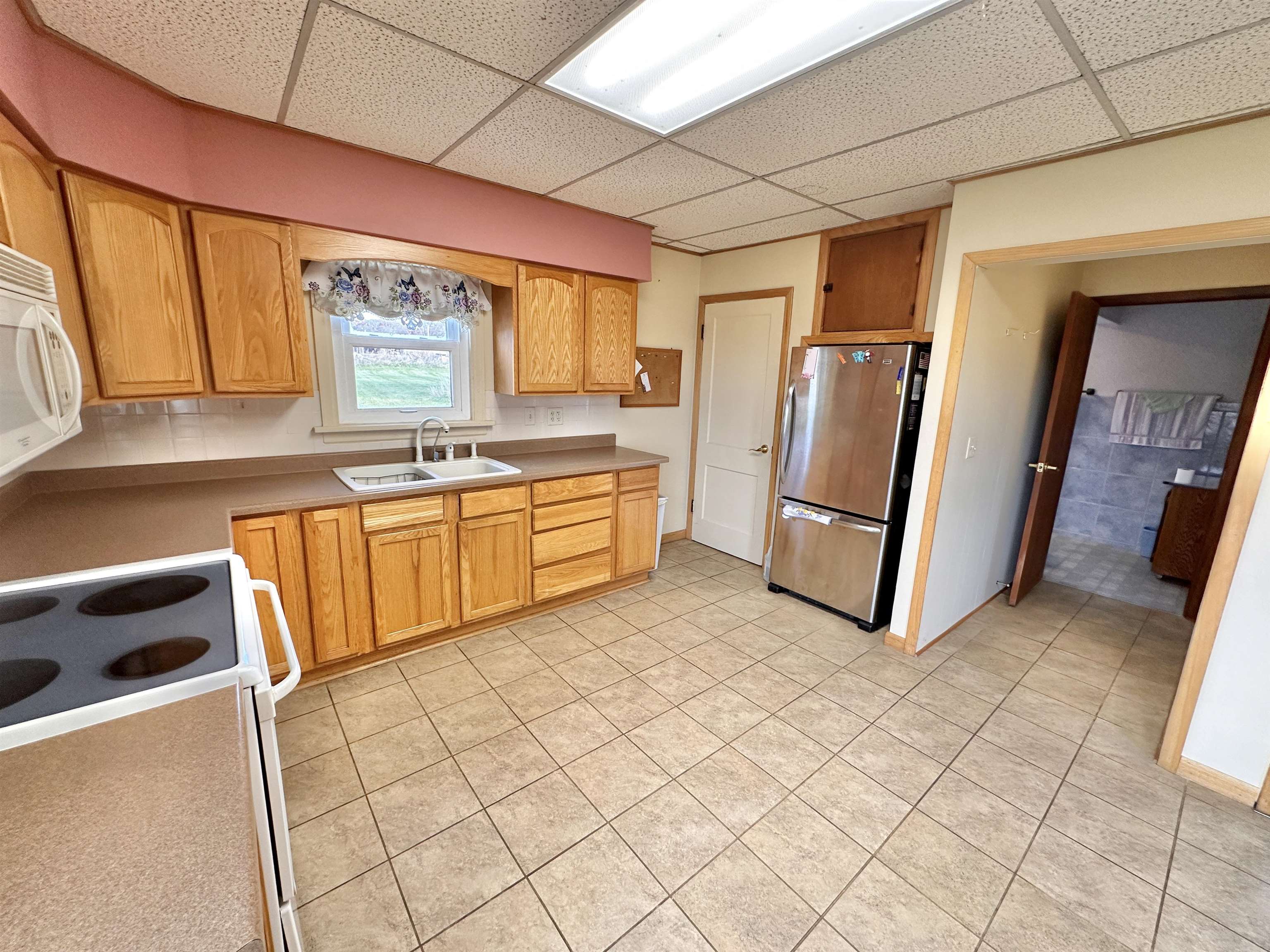 733 North Rock City Road Ridott, IL 61067 - Photo 11 of 35 a kitchen with a sink appliances and cabinets