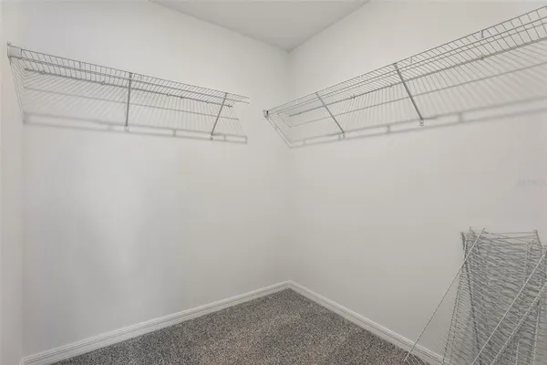 a bathroom with a sink toilet and a mirror