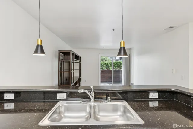 a bathroom with a sink and a window