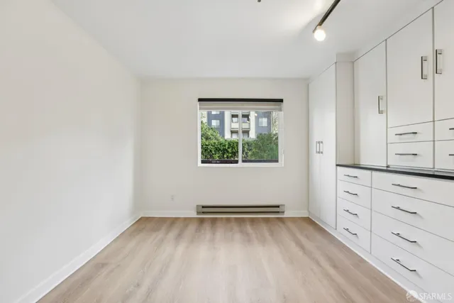 a front view of building with yard