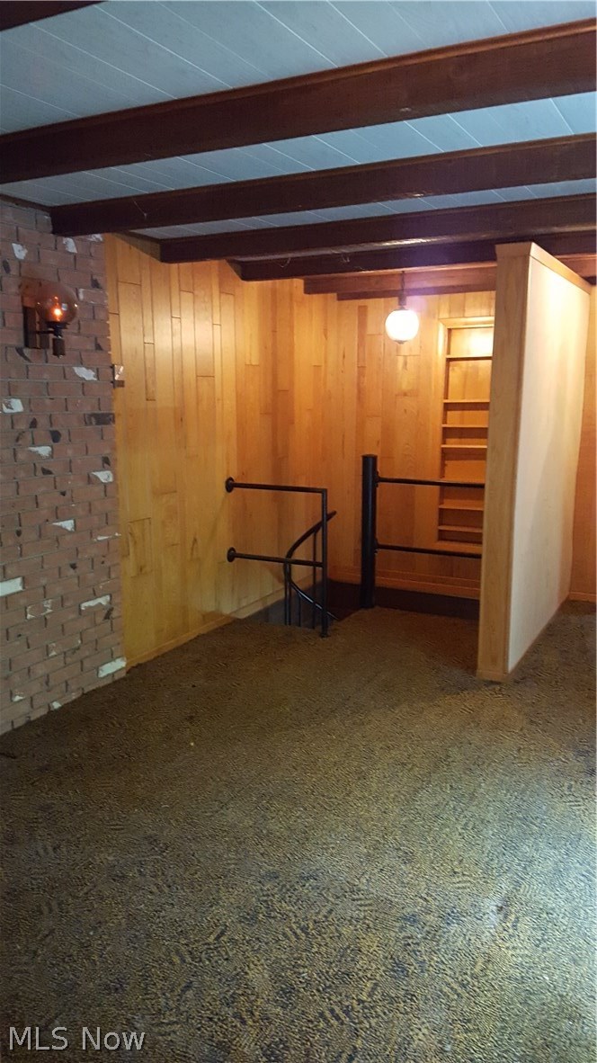 Bedroom at top of spiral stairs for lower level suite