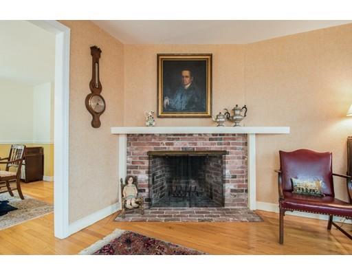 7 Howard Road Maynard, MA 01754 - Photo 7 of 28 a view of living room with furniture and a fireplace