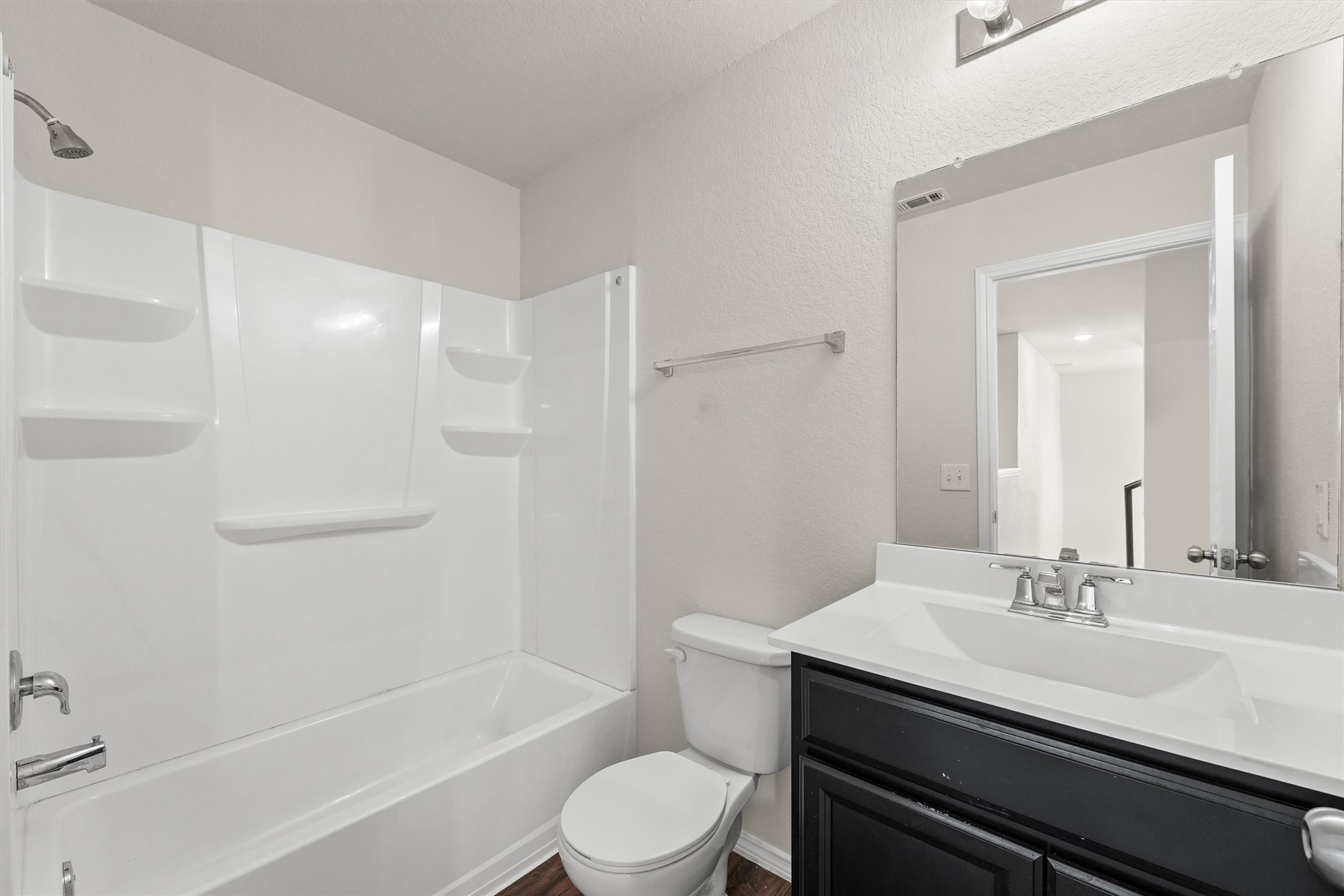 5710 Pampus Prairie Road Katy, TX 77493 - Photo 14 of 27 a bathroom with a sink a toilet and shower