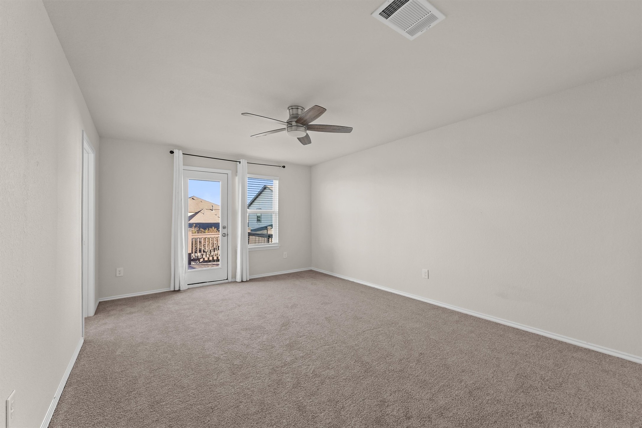 5710 Pampus Prairie Road Katy, TX 77493 - Photo 15 of 27 an empty room with windows and closet