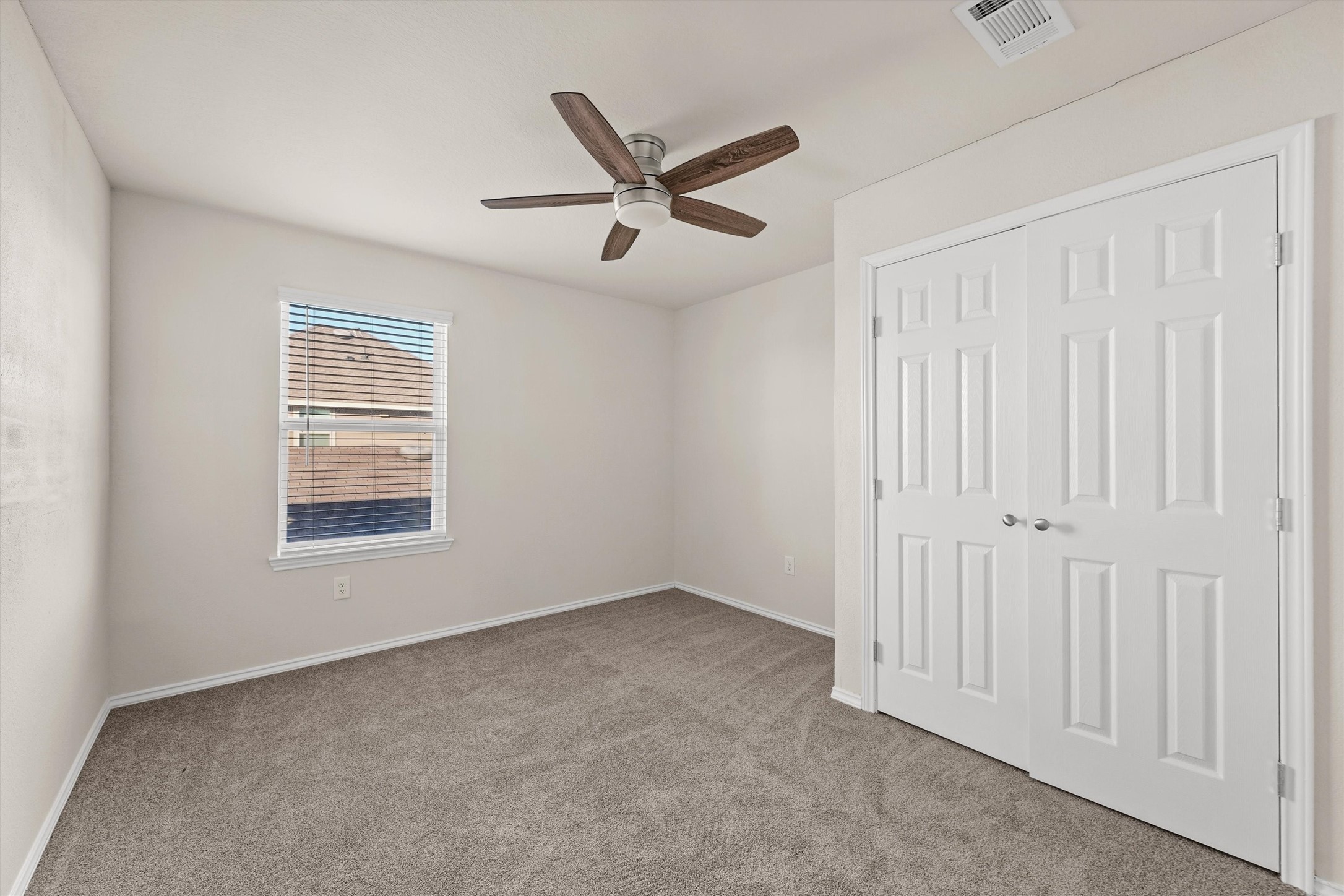5710 Pampus Prairie Road Katy, TX 77493 - Photo 20 of 27 a view of an empty room with a window