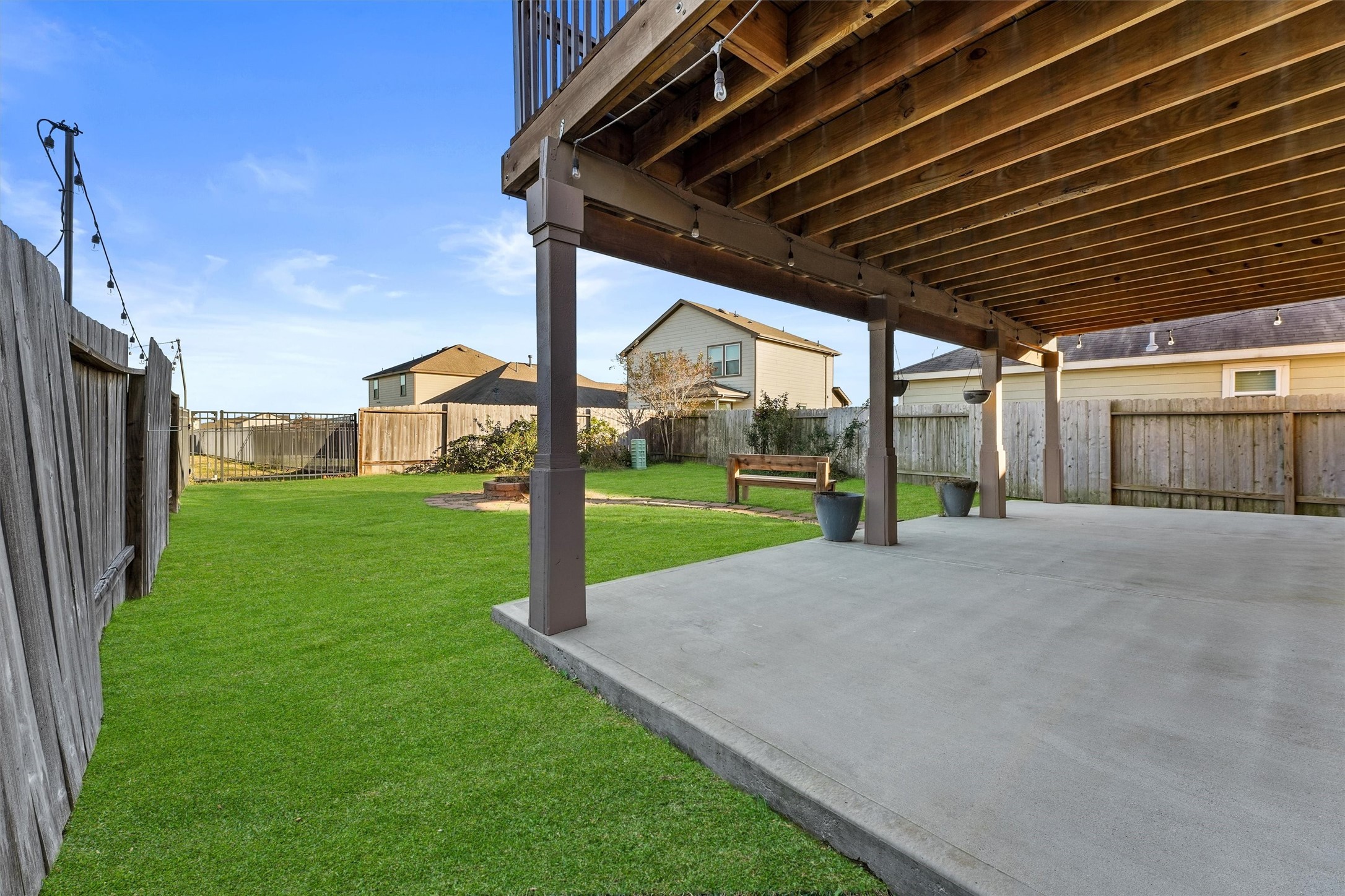 5710 Pampus Prairie Road Katy, TX 77493 - Photo 23 of 27 a view of a backyard with wooden fence