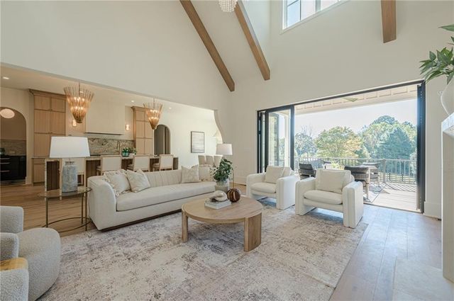 a kitchen with stainless steel appliances a refrigerator and a sink