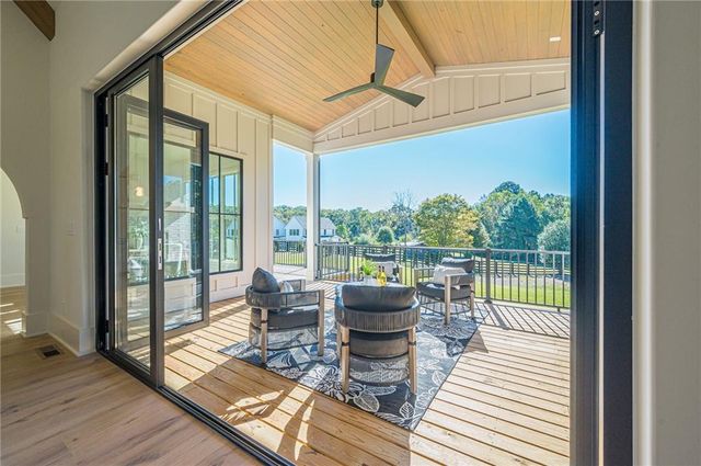 a view of entryway and hall with a window