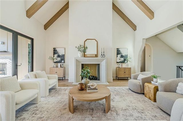 a white stove top oven sitting inside of a kitchen