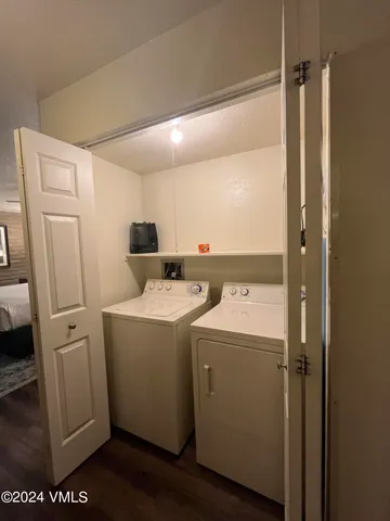 a utility room with dryer and washer