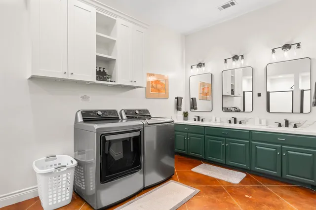 a stove top oven sitting inside of a kitchen