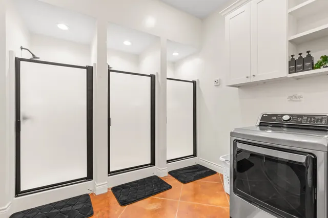 a view of a bathroom with a toilet and a shower