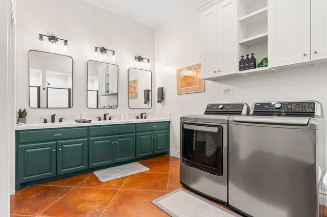 a kitchen with stainless steel appliances a stove and a refrigerator