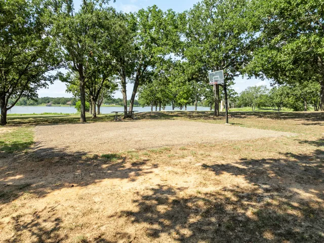 a view of a swimming pool and an outdoor space