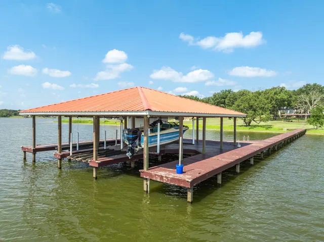 a view of a lake with a patio