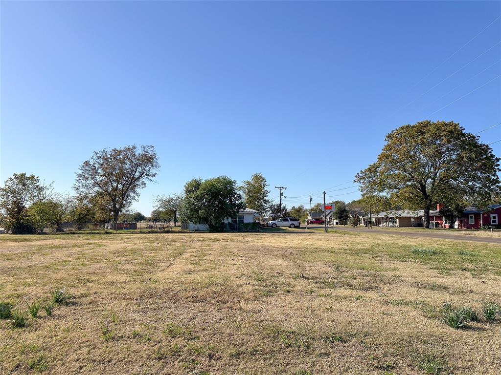 602 South 3rd Street Mabank, TX 75147 - Photo 13 of 18 a view of a field with trees in the background