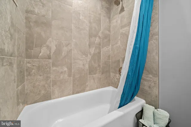 a bedroom with a bed and a closet