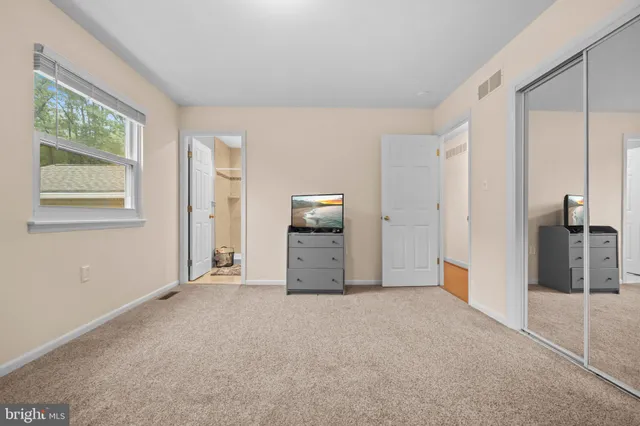 a view of livingroom with furniture and window