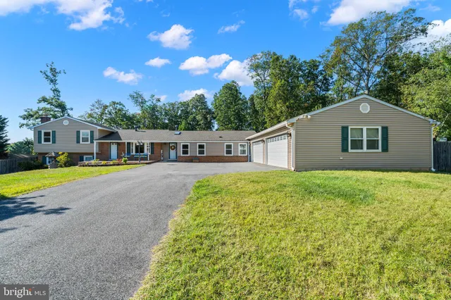 a view of a house with a swimming pool
