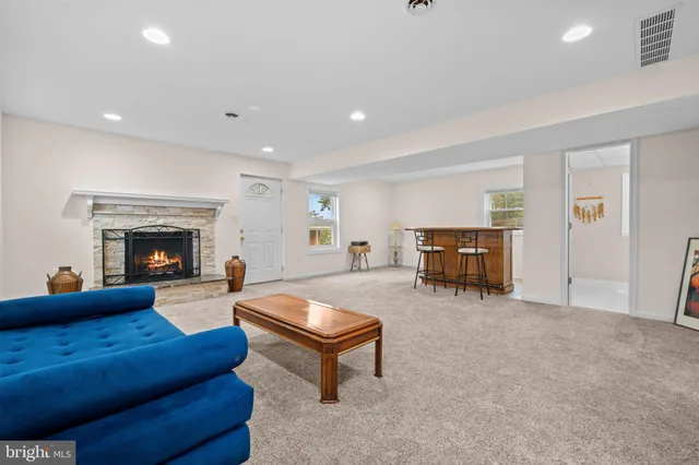 a view of a workspace with furniture