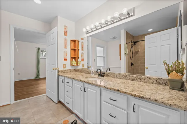 a view of a house with a yard patio and a patio