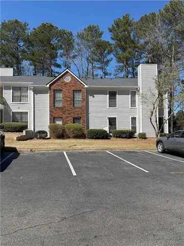 a view of a house with a street