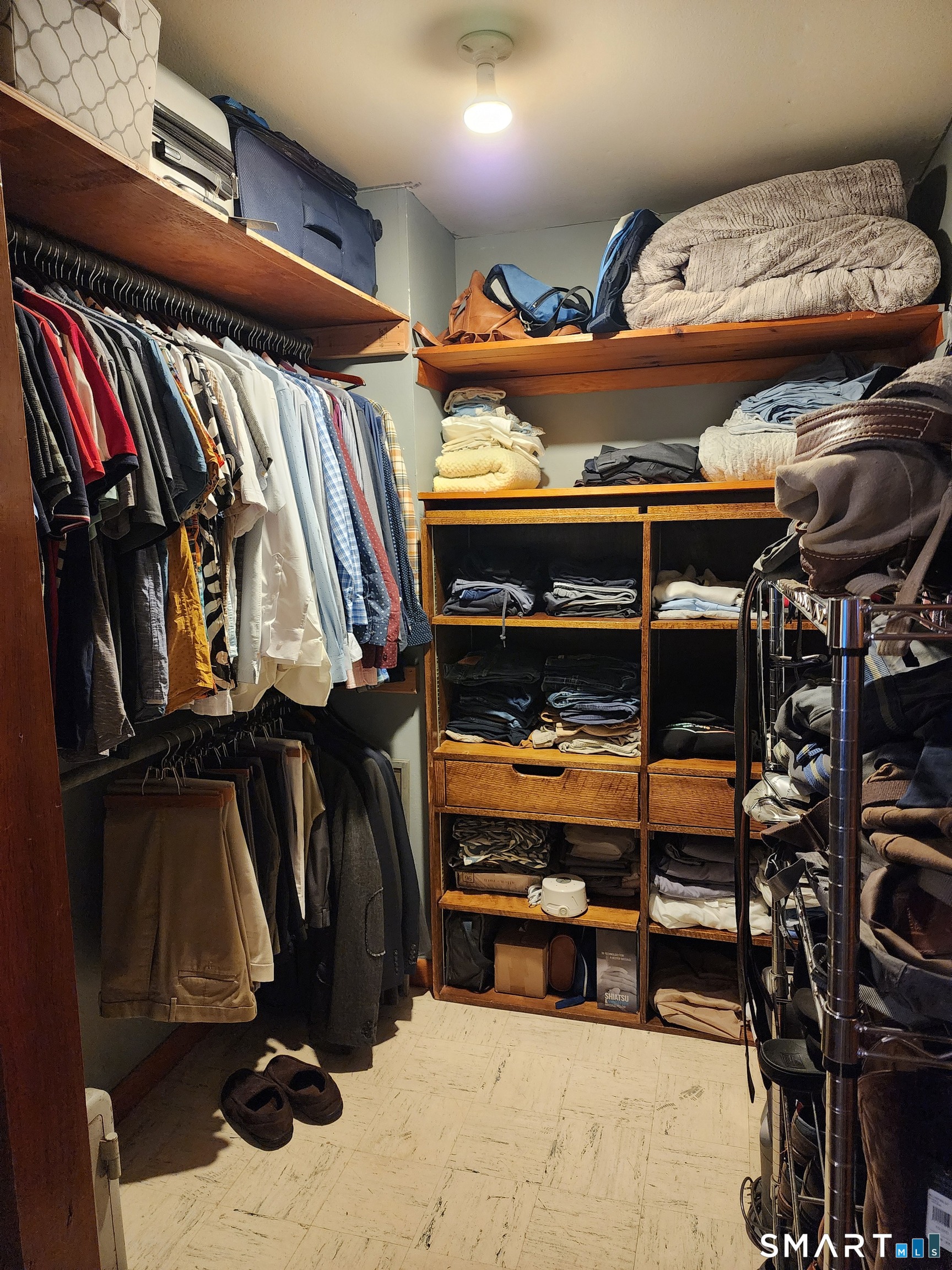 350 Hartford Pike Killingly, CT 06241 - Photo 22 of 28 a view of walk in closet with clothes and shoes