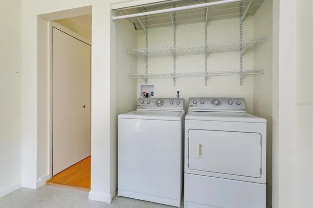 a utility room with dryer and washer