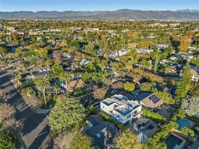 an aerial view of residential house with outdoor space