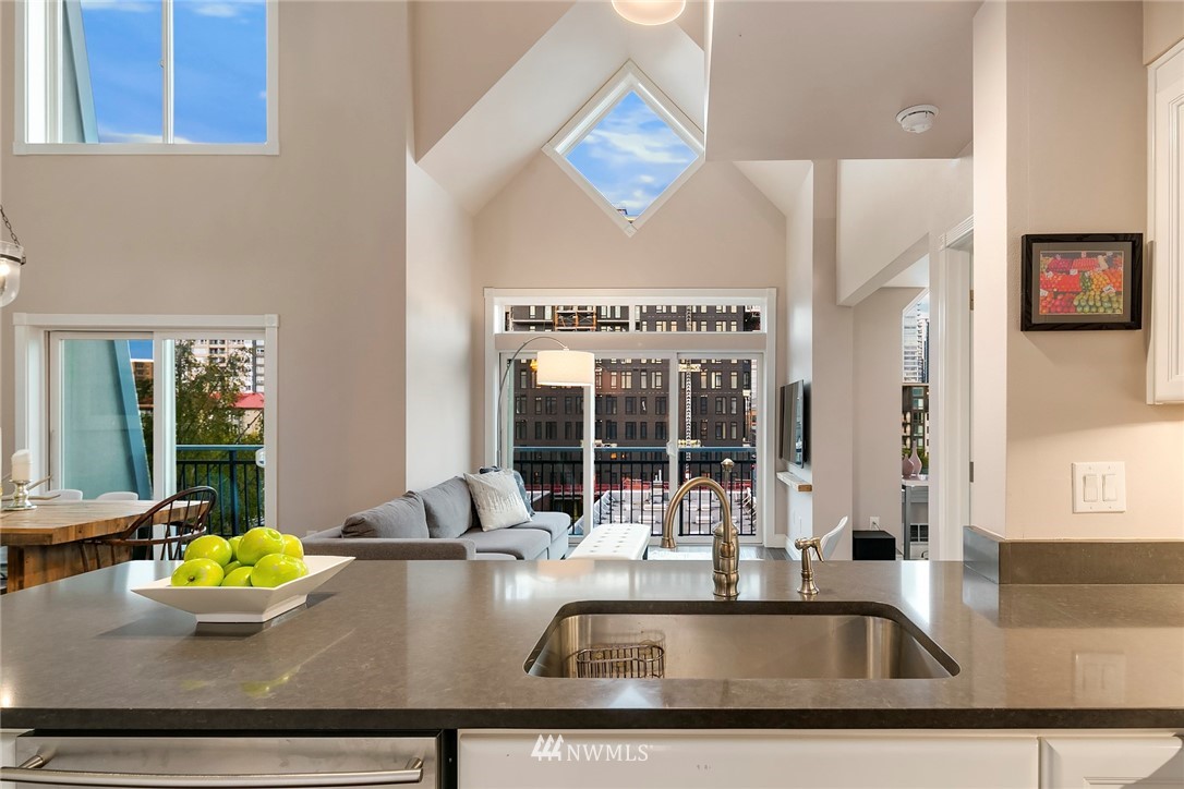 2415 2nd Avenue, Unit 734 Seattle, WA 98121 - Photo 8 of 23 a view of a living room with furniture