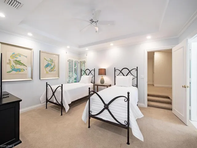 a bathroom with a granite countertop sink a shower and a mirror