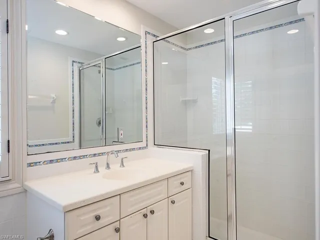 a bed room with a bed and a tv