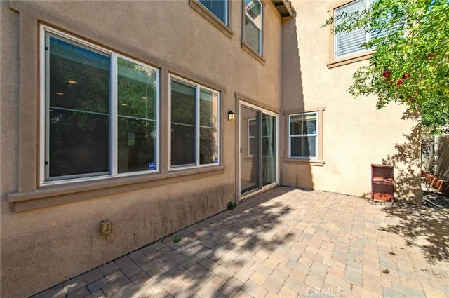 a view of a house with a large window