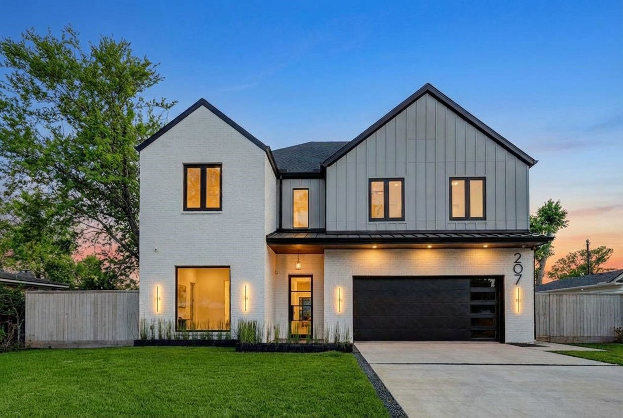 207 West 33rd Street Houston, TX 77018 - Photo 1 of 50 Striking first impression of this newly built residence in Garden Oaks, set on an expansive 13,985-square-foot lot with a clean, modern façade and impressive scale.