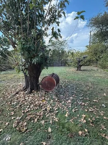 a view of outdoor space and yard