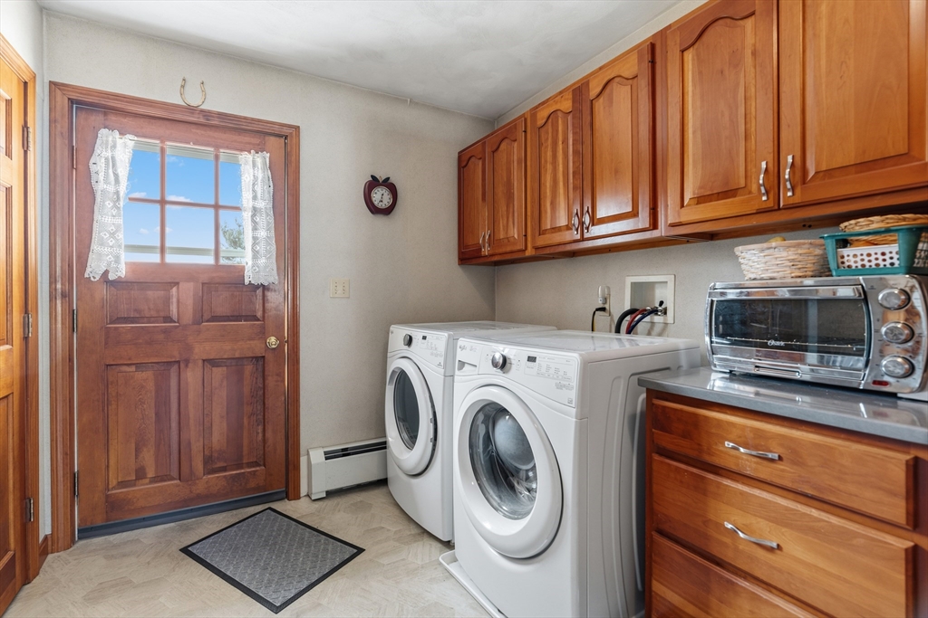 36 High Street Freetown, MA 02702 - Photo 31 of 42 a utility room with dryer and washer