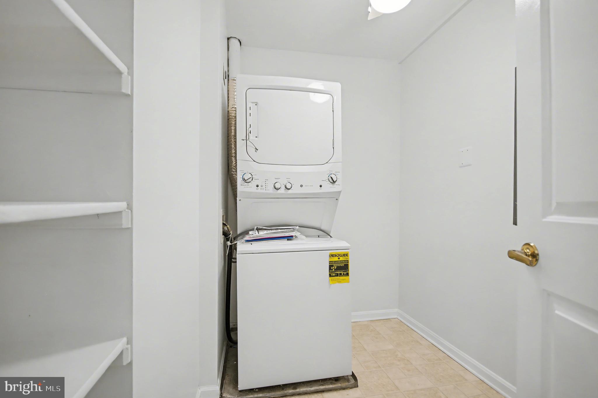 803 Coxswain Way, Unit 203 Annapolis, MD 21401 - Photo 21 of 44 a utility room with dryer and washer