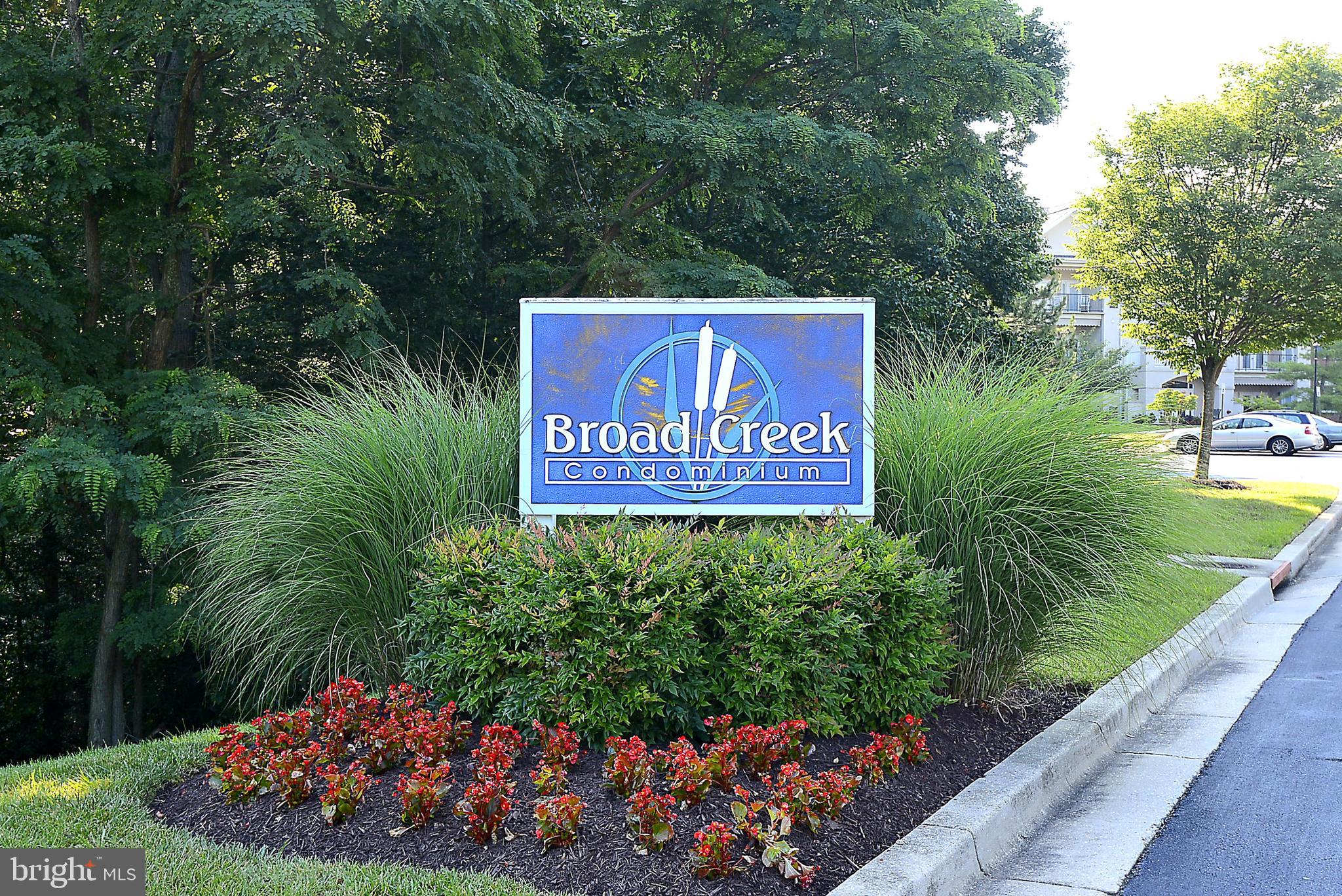 803 Coxswain Way, Unit 203 Annapolis, MD 21401 - Photo 3 of 44 a sign that is sitting in the middle of a park
