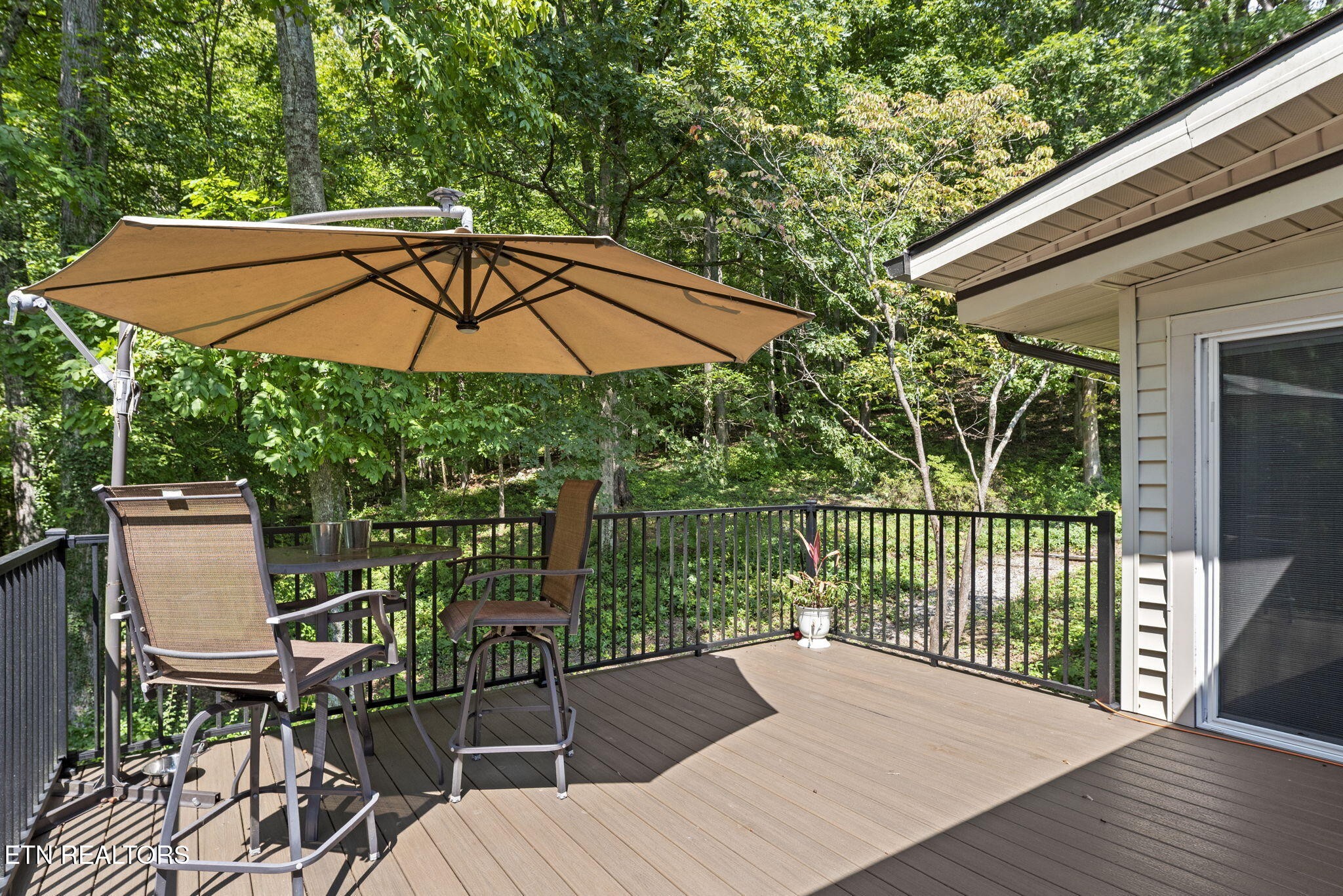 114 Canterbury Road Oak Ridge, TN 37830 - Photo 21 of 42 a view of a chair and tables in the balcony