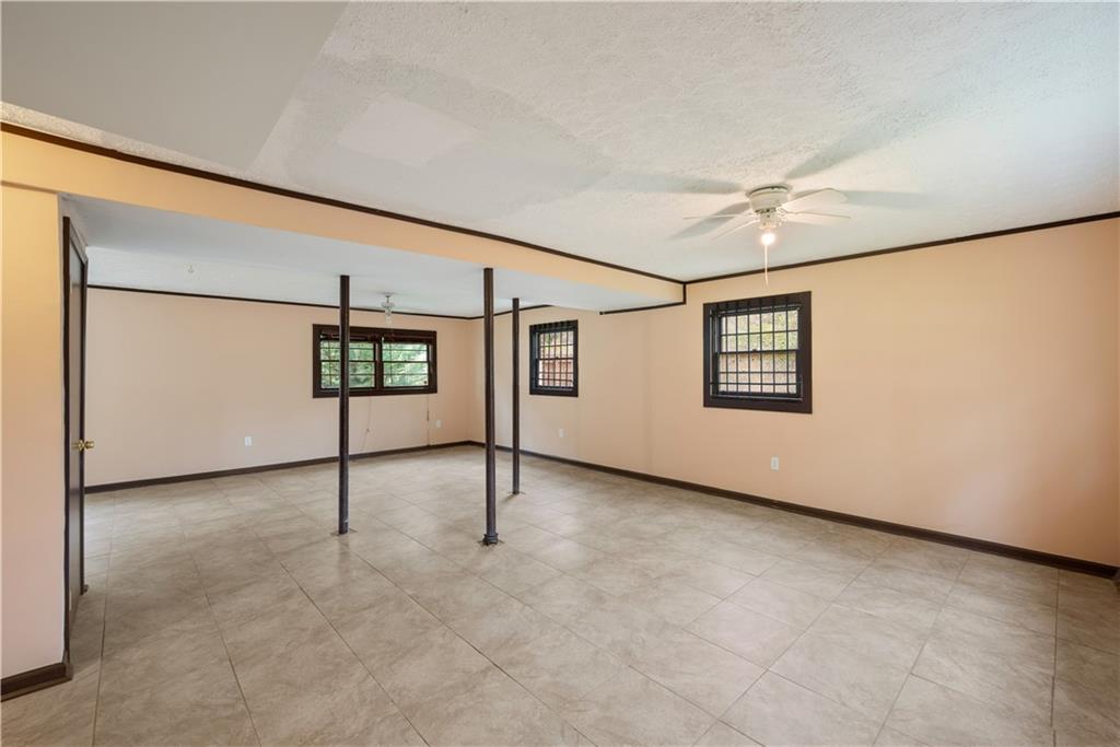 4329 Cedar Valley Lane Conley, GA 30288 - Photo 15 of 25 a view of an empty room with windows