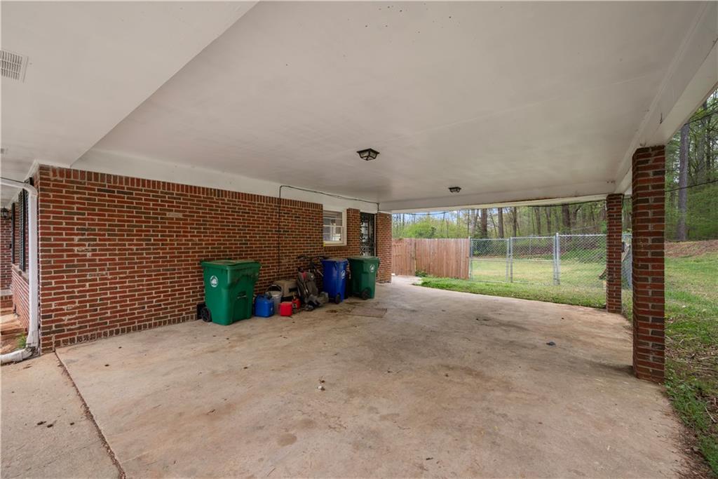 4329 Cedar Valley Lane Conley, GA 30288 - Photo 23 of 25 a view of a garden with an outdoor space